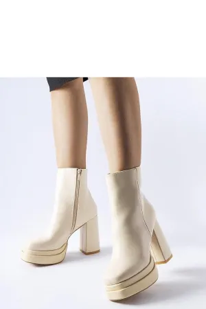 Beige high-heeled ankle boots