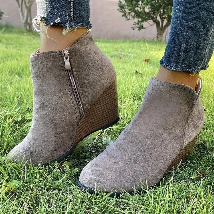 Women's side cut slip on wedge heel booties