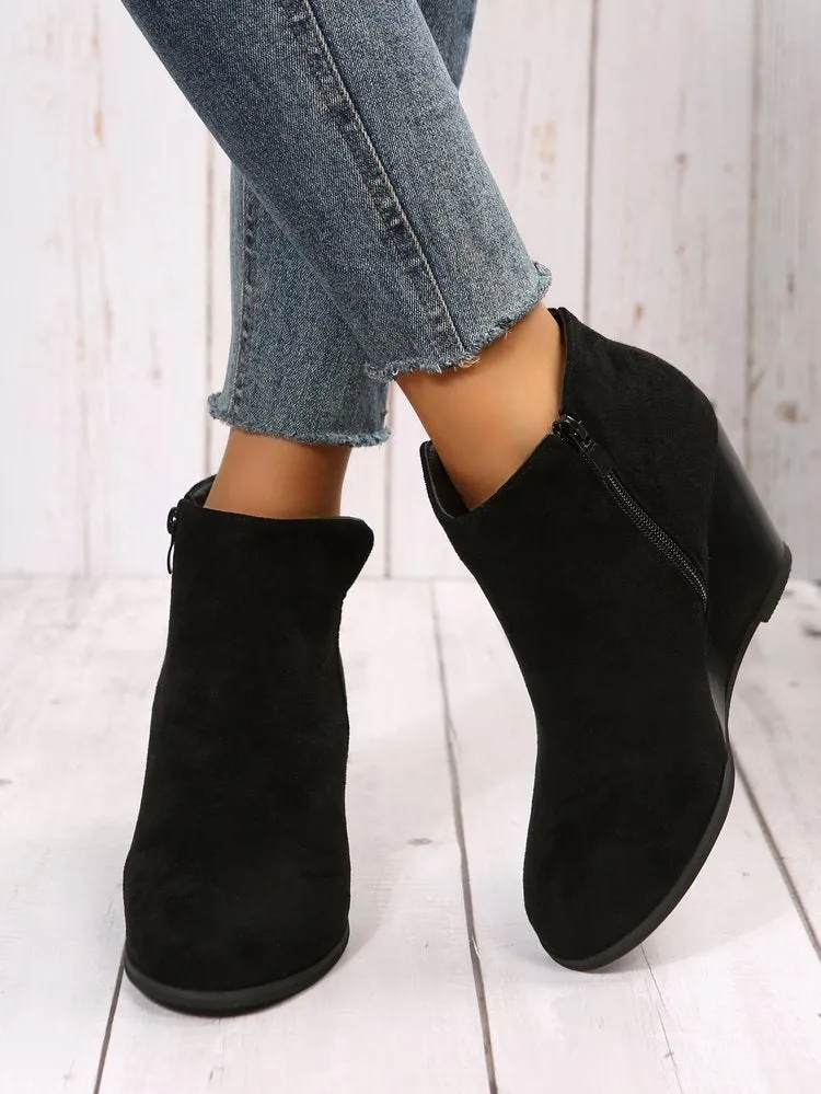 Women's side cut slip on wedge heel booties