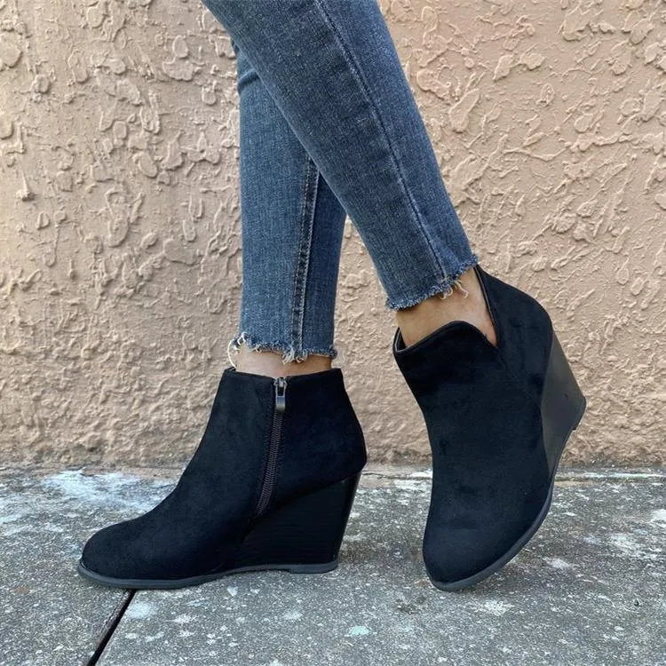 Women's side cut slip on wedge heel booties
