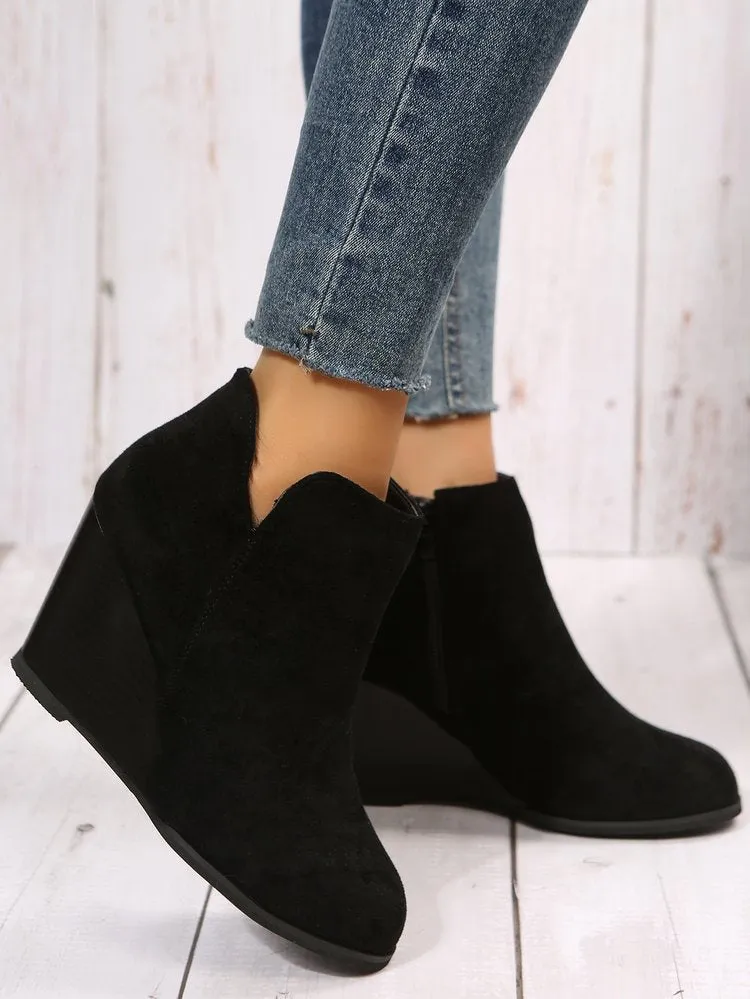 Women's side cut slip on wedge heel booties