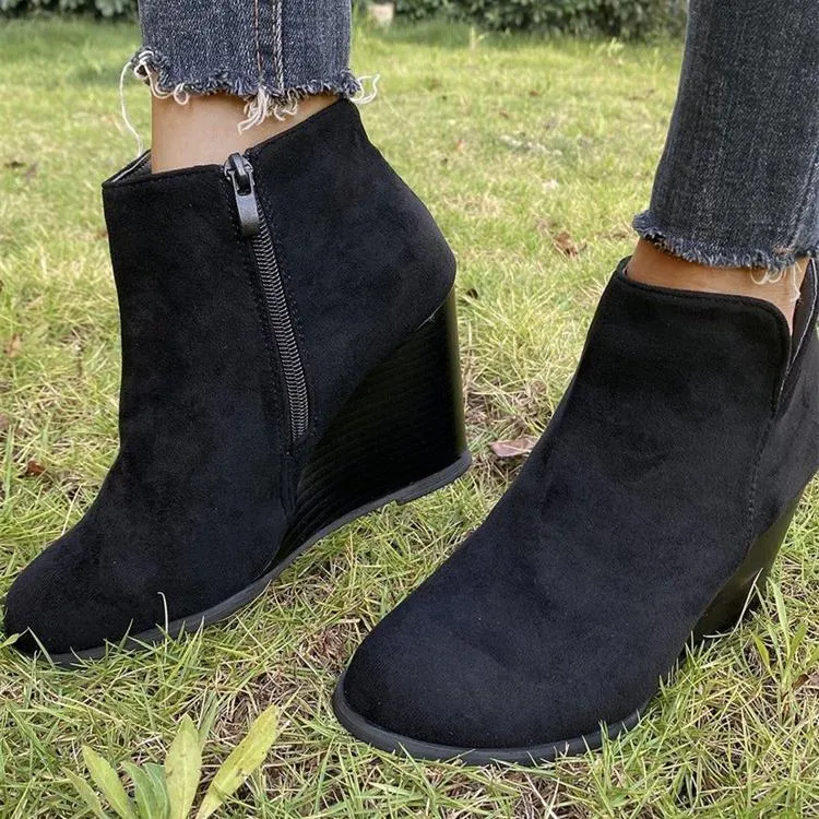 Women's side cut slip on wedge heel booties