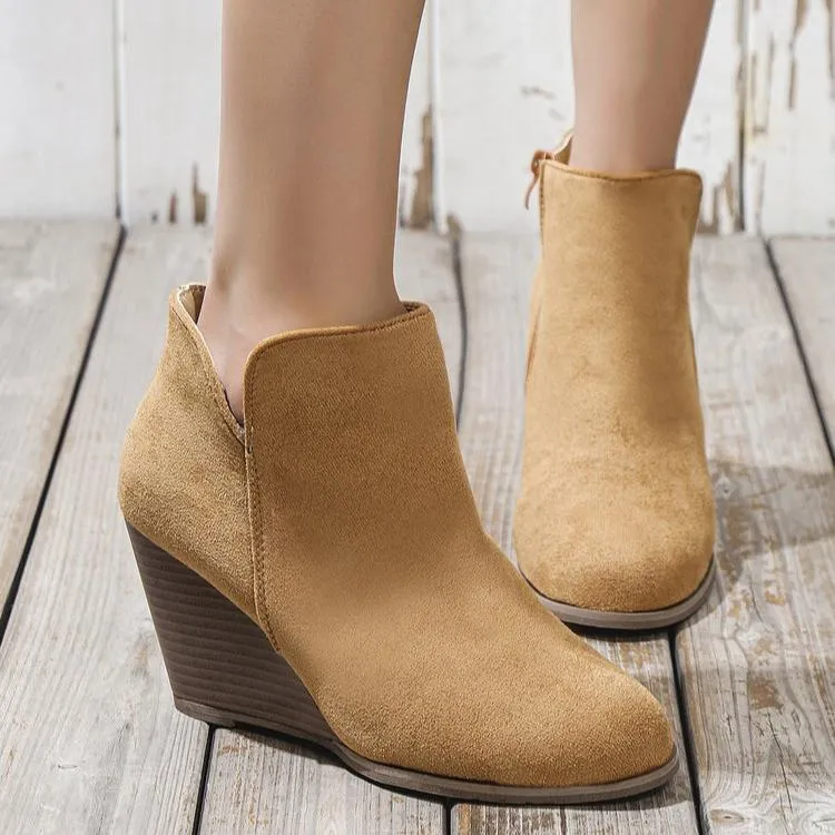 Women's side cut slip on wedge heel booties